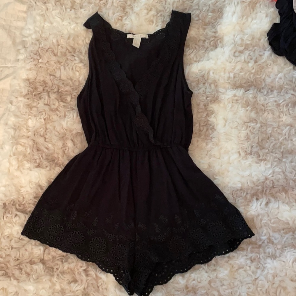 Small Black romper with floral detailing